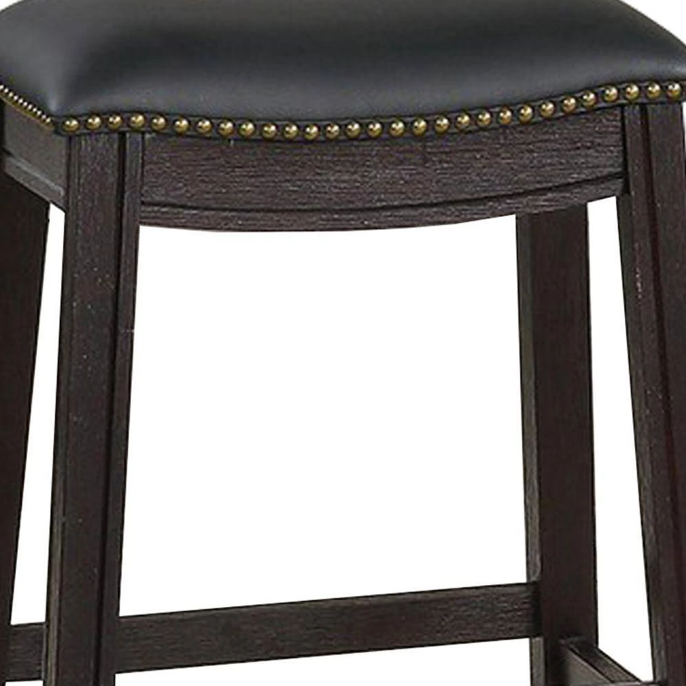 24 in. H Black Curved Leatherette Counter Stool with Nailhead Trim (Set of 2) by Benjara 3 24 in. H Black Curved Leatherette Counter Stool with Nailhead Trim (Set of 2) by Benjara - Image 3