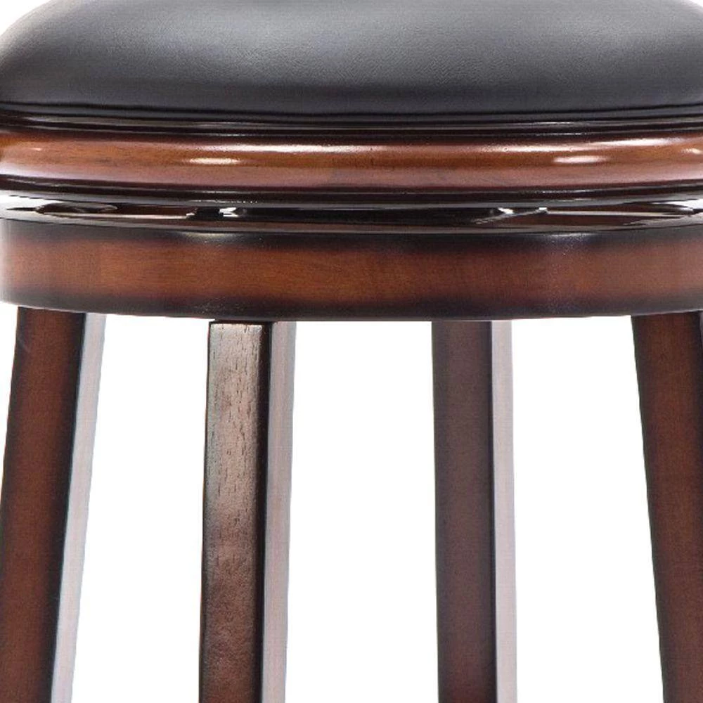 Pal 43.5 in. Brown Solid Wood Swivel Bar Stool with Rich Bonded Leather by Benjara 5 Pal 43.5 in. Brown Solid Wood Swivel Bar Stool with Rich Bonded Leather by Benjara - Image 5